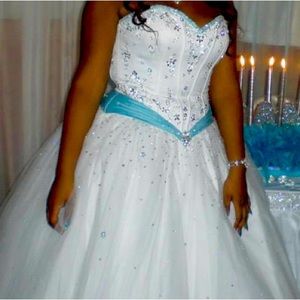 More pictures upon request. Beautiful white dress. Worn once, Fits a size large